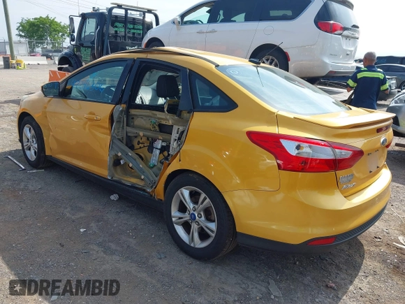 2012 Ford Focus SE with VIN 1FAHP3F2XCL220912, listed as a IAAI auction lot 42246306 with 99,162 mi miles and . Bid and sale history available at DreamBid. Image 3.
