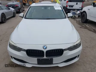 2014 BMW 3 Series 320i with VIN WBA3B1G58ENS80160, listed as a IAAI auction lot 42029951 with 97,306 mi miles. Bid and sale history available at carsss.com. Image 12.