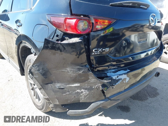 2019 Mazda CX-5 Sport with VIN JM3KFABM7K1579747, listed as a IAAI auction lot 41965097 with 151,042 mi miles and . Bid and sale history available at DreamBid. Image 6.