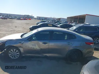 2018 Kia Optima LX with VIN 5XXGT4L32JG254229, listed as a IAAI auction lot 41668531 with 59,892 mi miles. Bid and sale history available at carsss.com. Image 14.