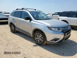 2020 Mitsubishi Outlander SE with VIN JA4AD3A31LJ000942, listed as a Copart auction lot 60103285 with 122,053 mi miles and Salvage title. Bid and sale history available at DreamBid. Image 4.