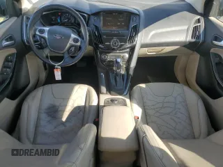 2014 Ford Focus Electric with VIN 1FADP3R45EL287285, listed as a Copart auction lot 74148154 with 64,543 mi miles and Salvage title. Bid and sale history available at DreamBid. Image 8.