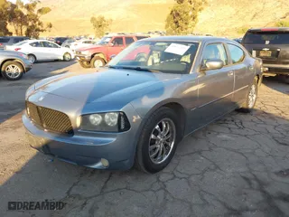 2006 Dodge Charger R/T with VIN 2B3KA53H26H361580, listed as a IAAI auction lot 40874293 with 239,930 mi miles. Bid and sale history available at carsss.com. Image 2.