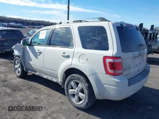 2012 Ford Escape Limited with VIN 1FMCU9E79CKC34718, listed as a IAAI auction lot 41461573 with 100,310 mi miles. Bid and sale history available at carsss.com. Image 3.