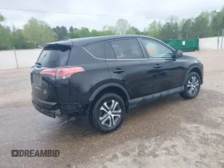2018 Toyota RAV4 LE with VIN 2T3BFREV8JW777510, listed as a IAAI auction lot 41974675 with 62,795 mi miles. Bid and sale history available at carsss.com. Image 4.