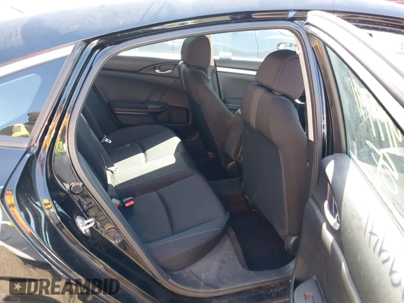 2020 Honda Civic LX with VIN 2HGFC2F69LH532499, listed as a IAAI auction lot 41919941 with 96,936 mi miles and . Bid and sale history available at DreamBid. Image 8.