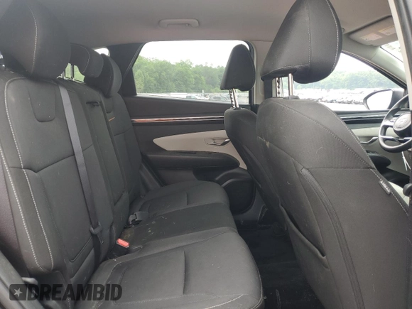 2022 Hyundai Tucson SEL z VIN 5NMJBCAE2NH037066, wystawiony jako Copart lot #59935565 z przebiegiem 54 998 mil mil oraz Szkoda całkowita • Salvage title. Historia ofert i sprzedaży dostępna na DreamBid. Obrazek 10.