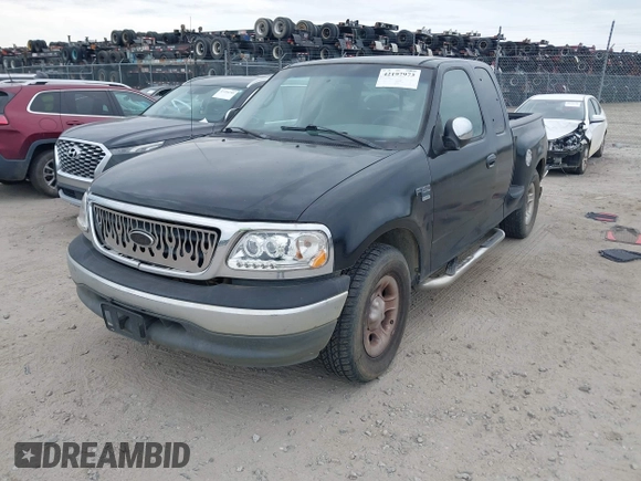 2000 Ford F-150 XL with VIN 1FTRX07W9YKB27455, listed as a IAAI auction lot 42197973 with 211,160 mi miles and . Bid and sale history available at DreamBid. Image 2.