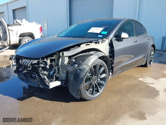 2018 Tesla Model 3 Long Range Battery with VIN 5YJ3E1EA8JF010834, listed as a IAAI auction lot 41598099 with 83,252 mi miles. Bid and sale history available at carsss.com. Image 2.