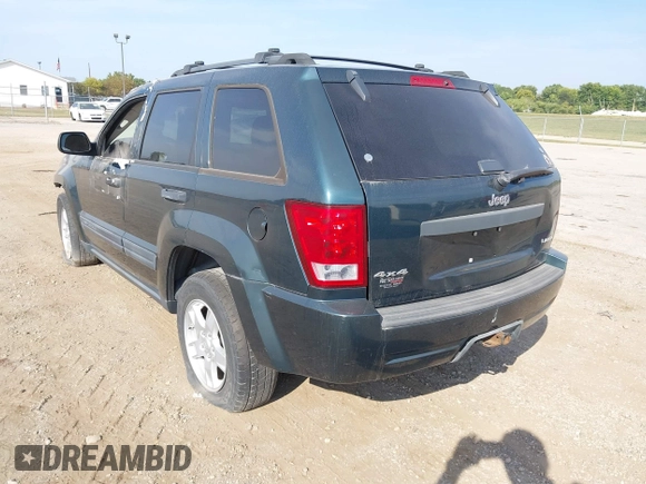 2005 Jeep Grand Cherokee Laredo z VIN 1J4GR48KX5C593240, wystawiony jako IAAI lot #40390746 z przebiegiem 177 646 mil mil oraz . Historia ofert i sprzedaży dostępna na DreamBid. Obrazek 3.