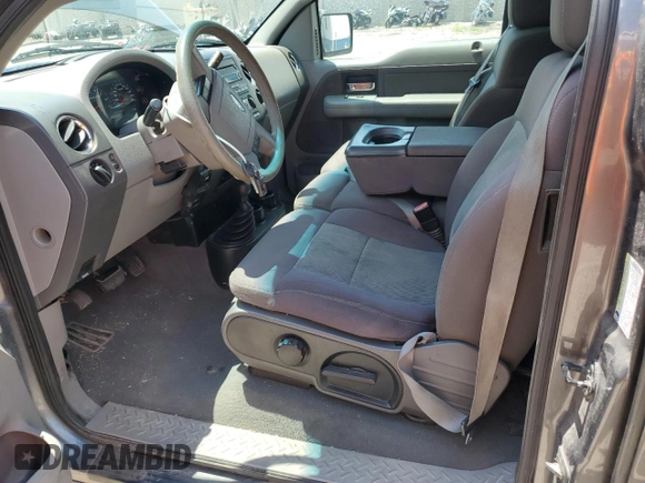 2005 Ford F-150 XLT with VIN 1FTPX14545FA18141, listed as a Copart auction lot 63351605 with 214,597 mi miles and Clean title. Bid and sale history available at DreamBid. Image 7.