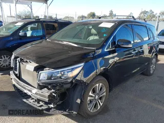 2021 Kia Sedona EX with VIN KNDMC5C10M6671729, listed as a IAAI auction lot 40858206 with 58,775 mi miles. Bid and sale history available at carsss.com. Image 18.