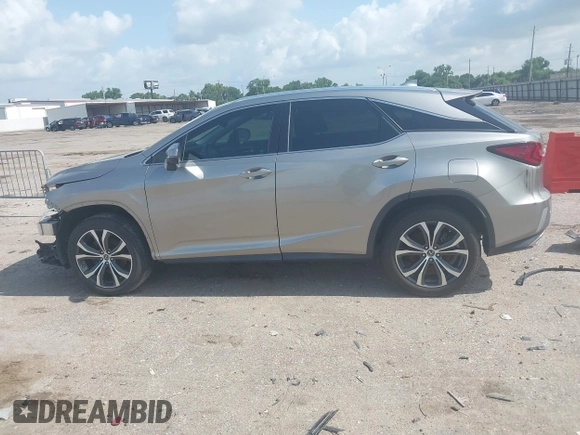 2019 Lexus RX 350 z VIN 2T2ZZMCA3KC123630, wystawiony jako IAAI lot #42436711 z przebiegiem 63 989 mil mil oraz . Historia ofert i sprzedaży dostępna na DreamBid. Obrazek 15.
