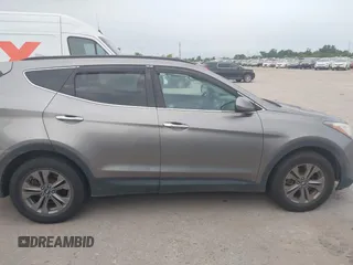 2016 Hyundai Santa Fe z VIN 5XYZU3LB3GG370826, wystawiony jako IAAI lot #42325158 z przebiegiem 146 916 mil mil oraz . Historia ofert i sprzedaży dostępna na DreamBid. Obrazek 13.