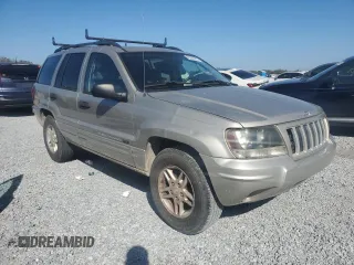 2004 Jeep Grand Cherokee with VIN 1J8GX48S84C329291, listed as a Copart auction lot 43295185 with 234,680 mi miles and Salvage title. Bid and sale history available at DreamBid. Image 4.
