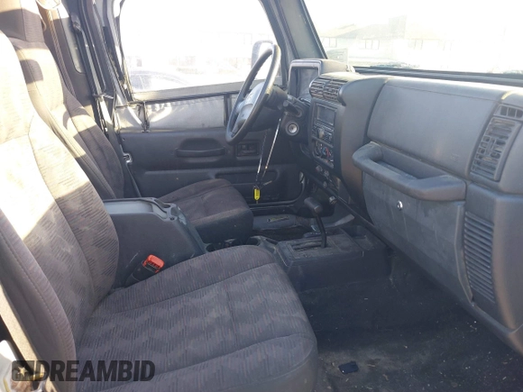 2005 Jeep Wrangler X with VIN 1J4FA39S55P348432, listed as a IAAI auction lot 41868451 with 166,876 mi miles. Bid and sale history available at carsss.com. Image 5.