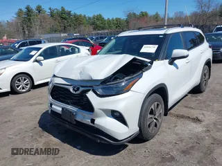 2023 Toyota Highlander L with VIN 5TDKDRBHXPS044812, listed as a IAAI auction lot 42026730 with 27,591 mi miles and . Bid and sale history available at DreamBid. Image 2.