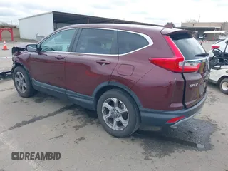 2019 Honda CR-V EX with VIN 7FARW2H56KE053022, listed as a IAAI auction lot 41848570 with 128,676 mi miles. Bid and sale history available at carsss.com. Image 3.