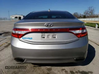 2013 Hyundai Azera с VIN KMHFG4JG8DA256908, выставлен на аукционе Copart как лот 50573915 с пробегом 146 015 миль миль и Списание • Salvage title. История ставок и продаж доступна на DreamBid. Изображение 6.