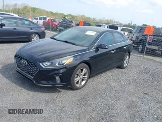 2019 Hyundai Sonata SEL with VIN 5NPE34AF8KH739419, listed as a IAAI auction lot 42125603 with 123,540 mi miles and . Bid and sale history available at DreamBid. Image 2.