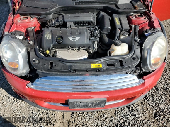 2011 MINI Hardtop with VIN WMWSU3C58BT183765, listed as a Copart auction lot 63061405 with 59,902 mi miles and Salvage title. Bid and sale history available at DreamBid. Image 11.