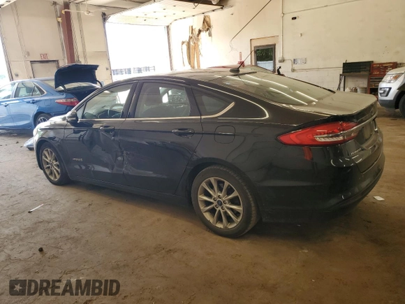 2017 Ford Fusion Hybrid SE z VIN 3FA6P0LU2HR247283, wystawiony jako Copart lot #62571495 z przebiegiem 167 042 mil mil oraz Nie do naprawy • Non repairable. Historia ofert i sprzedaży dostępna na DreamBid. Obrazek 2.