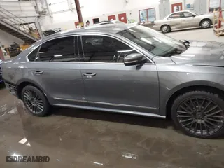 2015 Volkswagen Passat 2.0L TDI SE w/Sunroof with VIN 1VWBV7A3XFC094226, listed as a IAAI auction lot 41838239 with 169,737 mi miles. Bid and sale history available at carsss.com. Image 14.