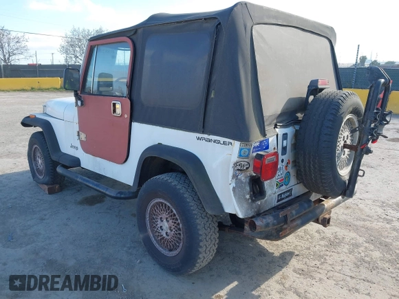 1995 Jeep Wrangler S with VIN 1J4FY19P6SP210468, listed as a IAAI auction lot 41882009 with 133,705 mi miles. Bid and sale history available at carsss.com. Image 3.