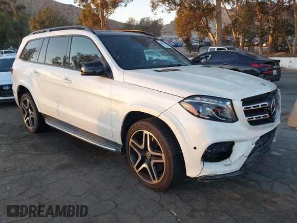 2018 Mercedes-Benz GLS 550 z VIN 4JGDF7DE2JB097282, wystawiony jako IAAI lot #41060046 z przebiegiem 71 317 mil mil oraz . Historia ofert i sprzedaży dostępna na DreamBid. Obrazek 1.
