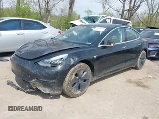 2018 Tesla Model 3 Long Range Battery z VIN 5YJ3E1EB2JF103096, wystawiony jako IAAI lot #42016324 z przebiegiem 143 247 mil mil oraz . Historia ofert i sprzedaży dostępna na DreamBid. Obrazek 6.