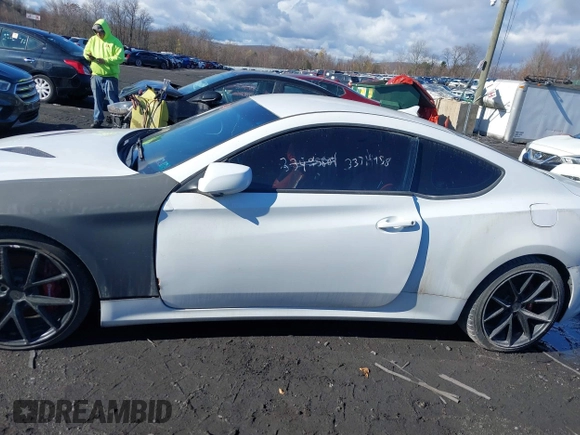 2013 Hyundai Genesis Coupe Grand Touring with VIN KMHHU6KJ7DU096543, listed as a IAAI auction lot 33714958 with 129,768 mi miles and . Bid and sale history available at DreamBid. Image 14.