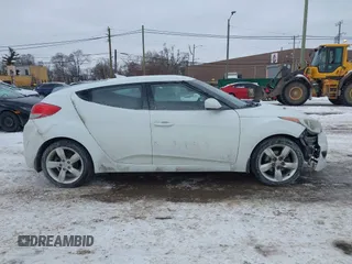 2013 Hyundai Veloster w/Black Int with VIN KMHTC6AD9DU171722, listed as a IAAI auction lot 41617721 with 115,791 mi miles and . Bid and sale history available at DreamBid. Image 13.