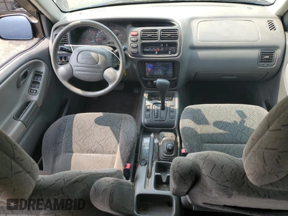 2004 Chevrolet Tracker ZR2 z VIN 2CNBJ734346903751, wystawiony jako Copart lot #59300765 z przebiegiem 126 924 mil mil oraz Szkoda całkowita • Salvage title. Historia ofert i sprzedaży dostępna na DreamBid. Obrazek 8.
