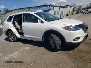 2014 Mazda CX-9 Touring with VIN JM3TB3CV1E0435396, listed as a Copart auction lot 52574695 with 150,478 mi miles and Salvage Title. Bid and sale history available at carsss.com. Image 4.
