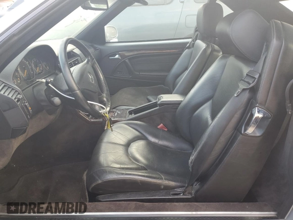 2000 Mercedes-Benz SL-Class with VIN WDBFA68F5YF193661, listed as a Copart auction lot 76386784 with 0 mi miles and Salvage Title. Bid and sale history available at carsss.com. Image 7.