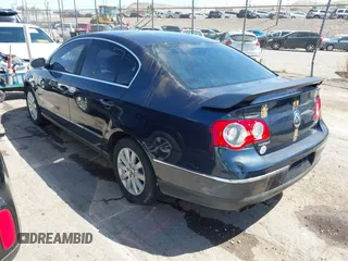 2008 Volkswagen Passat Komfort z VIN WVWJK73C28E241263, wystawiony jako IAAI lot #42021388 z przebiegiem 144 131 mil mil oraz . Historia ofert i sprzedaży dostępna na DreamBid. Obrazek 3.