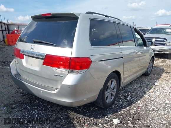 2009 Honda Odyssey Touring z VIN 5FNRL38999B052244, wystawiony jako IAAI lot #42085003 z przebiegiem 269 402 mil mil oraz . Historia ofert i sprzedaży dostępna na DreamBid. Obrazek 4.