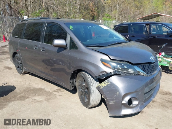 2015 Toyota Sienna SE with VIN 5TDXK3DC3FS682327, listed as a IAAI auction lot 41983156 with 141,640 mi miles. Bid and sale history available at carsss.com. Image 1.