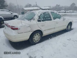 1996 Mercury Mystique z VIN 1MELM653XTK605481, wystawiony jako IAAI lot #41543215 z przebiegiem 120 988 mil mil oraz . Historia ofert i sprzedaży dostępna na DreamBid. Obrazek 4.