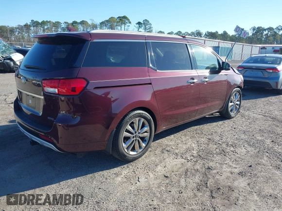 2015 Kia Sedona SX-L with VIN KNDME5C16F6039671, listed as a IAAI auction lot 41736237 with 113,035 mi miles and . Bid and sale history available at DreamBid. Image 4.
