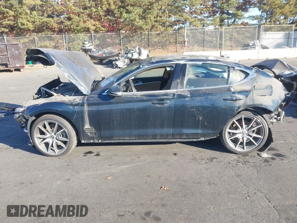 2022 Genesis G70 2.0T with VIN KMTG34TA1NU092657, listed as a IAAI auction lot 40653081 with Not provided miles and . Bid and sale history available at DreamBid. Image 13.