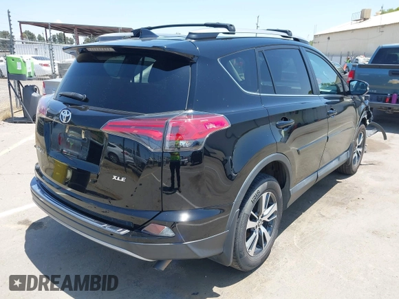 2018 Toyota RAV4 XLE with VIN 2T3WFREV2JW447623, listed as a IAAI auction lot 42410168 with 84,800 mi miles and . Bid and sale history available at DreamBid. Image 4.