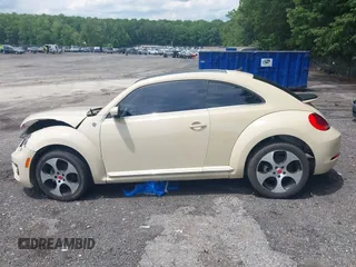 2019 Volkswagen Beetle S with VIN 3VWFD7AT2KM700941, listed as a IAAI auction lot 42474867 with 43,891 mi miles and . Bid and sale history available at DreamBid. Image 15.