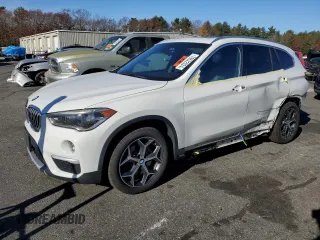 2016 BMW X1 xDrive28i with VIN WBXHT3C32G5E52052, listed as a Copart auction lot 79522024 with 76,995 mi miles and Salvage Title. Bid and sale history available at carsss.com. Image 1.