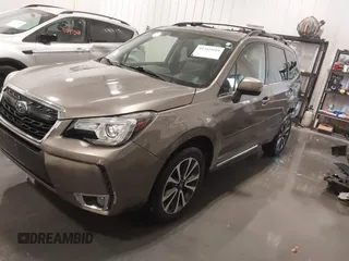 2017 Subaru Forester Touring with VIN JF2SJGTC4HH558808, listed as a IAAI auction lot 41565049 with 79,713 mi miles. Bid and sale history available at carsss.com. Image 2.