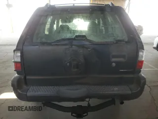 2001 Isuzu Rodeo S with VIN 4S2CK58W614344850, listed as a Copart auction lot 63807664 with 176,203 mi miles and Salvage title. Bid and sale history available at DreamBid. Image 6.