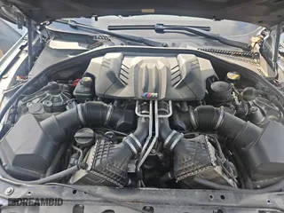 2016 BMW M5 with VIN WBSFV9C56GG343672, listed as a Copart auction lot 44406554 with 84,402 mi miles. Bid and sale history available at carsss.com. Image 7.