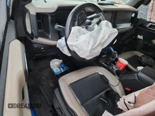 2021 Ford Bronco z VIN 1FMEE5DPXMLB01431, wystawiony jako Copart lot #59192915 z przebiegiem Nie podano mil oraz Nie do naprawy • Non repairable. Historia ofert i sprzedaży dostępna na DreamBid. Obrazek 8.