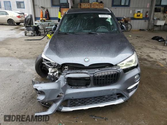 2016 BMW X1 xDrive28i with VIN WBXHT3C31G5E55041, listed as a Copart auction lot 48928705 with 104,799 mi miles and Salvage Title. Bid and sale history available at carsss.com. Image 5.