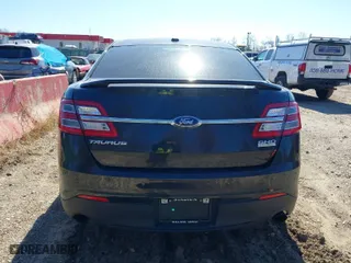2014 Ford Taurus SHO with VIN 1FAHP2KT0EG164404, listed as a IAAI auction lot 41899695 with 157,077 mi miles. Bid and sale history available at carsss.com. Image 17.